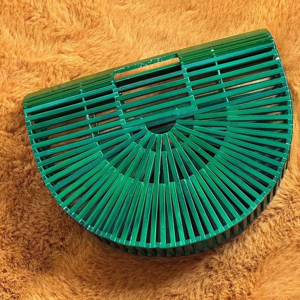 Wooden green clutch . Never used